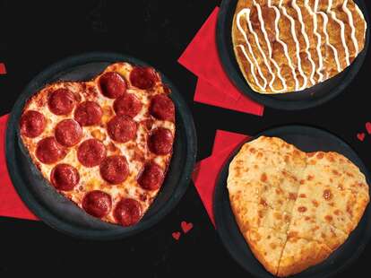 Heart-shaped Jet's pizza, cinnamon stix, and bread.