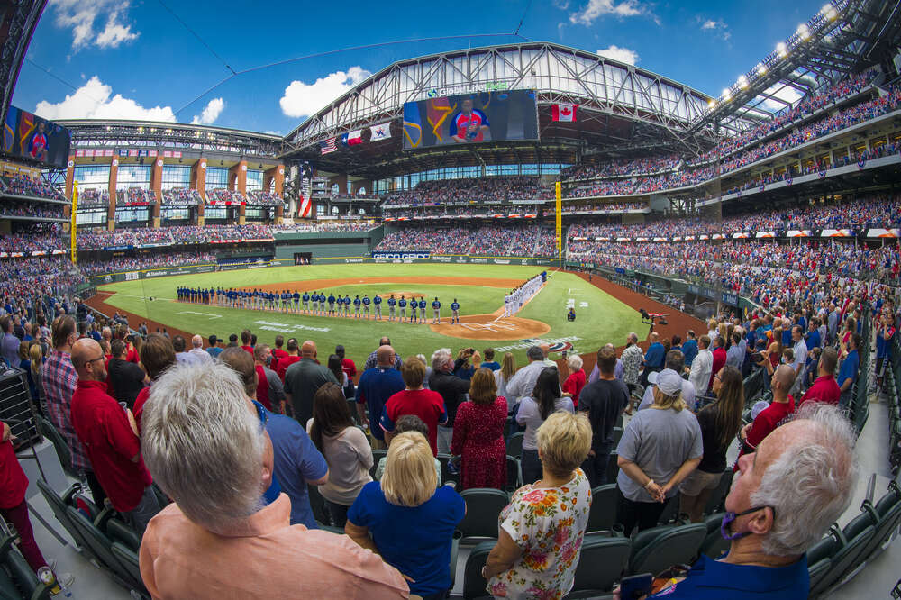 Texas Rangers play MLB home opener in front of packed stadium.