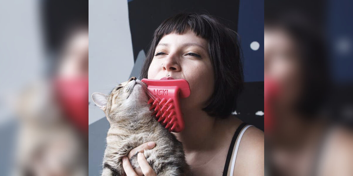 Cat licking shop brush shark tank