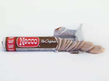 A roll of chocolate Necco wafers.