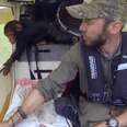 Baby Chimp Falls Asleep In Pilot's Lap While They Fly To Safety