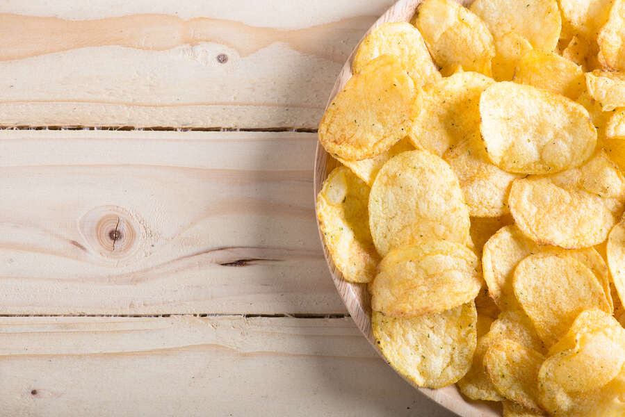 Lay S New Potato Chips Are Coated In Doritos Cool Ranch Dust Thrillist