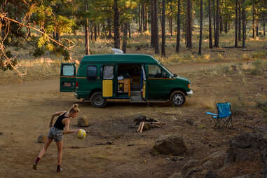 Van camping in the woods