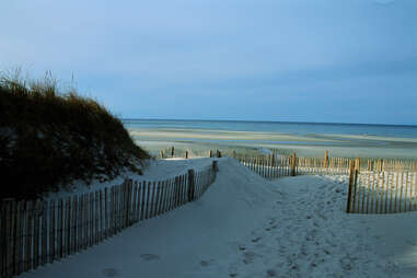 Sand fence entering Mayflower Beach, Dennis, MA.