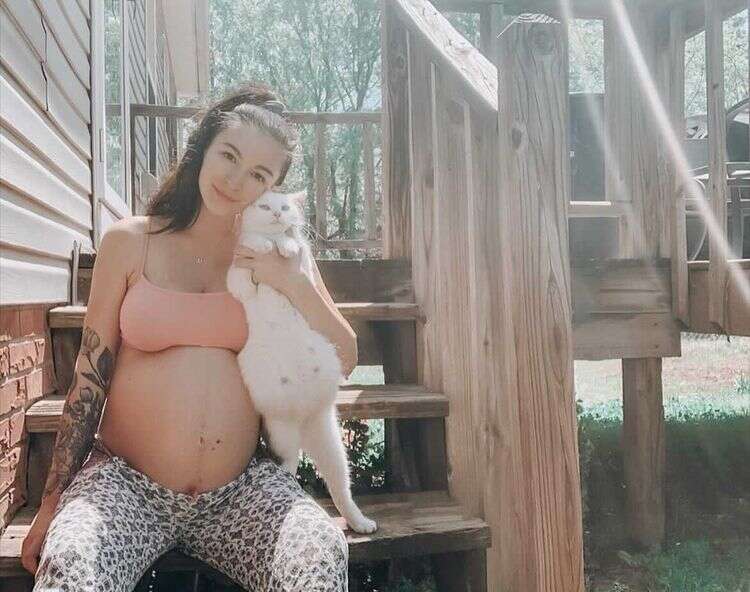 pregnant woman and cat