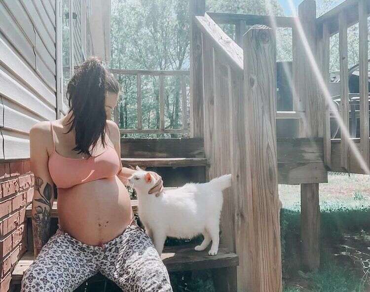 pregnant woman and cat