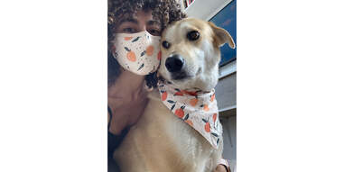 woman and dog in their matching Goodboy mask and bandana set