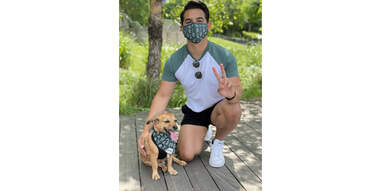man and dog wearing matching Goodboy Mask and Bandana set