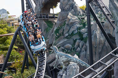 guests riding the Jurassic World Velocicoaster at Universal Studios Florida