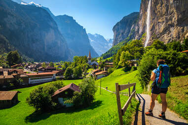 woman hiking in Lauterbrunnen village, switzerland