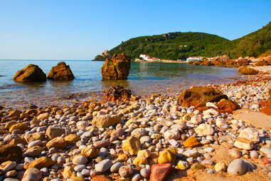 rocky beach at Portinho da Arrabida in the Parque Natural da Arrabida, Setubal, Portugal