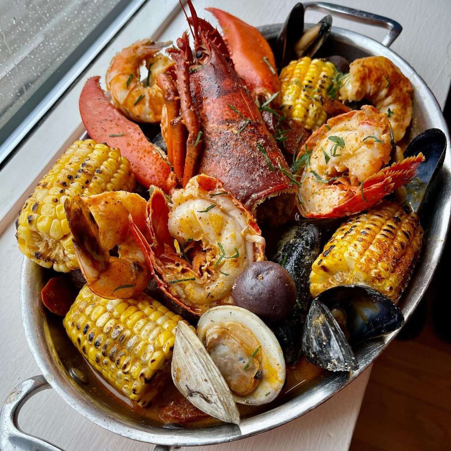 how-to-recreate-a-new-england-clambake-at-home-thrillist