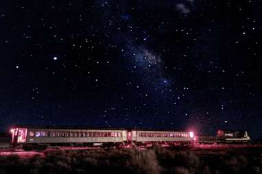 a train in the desert at night