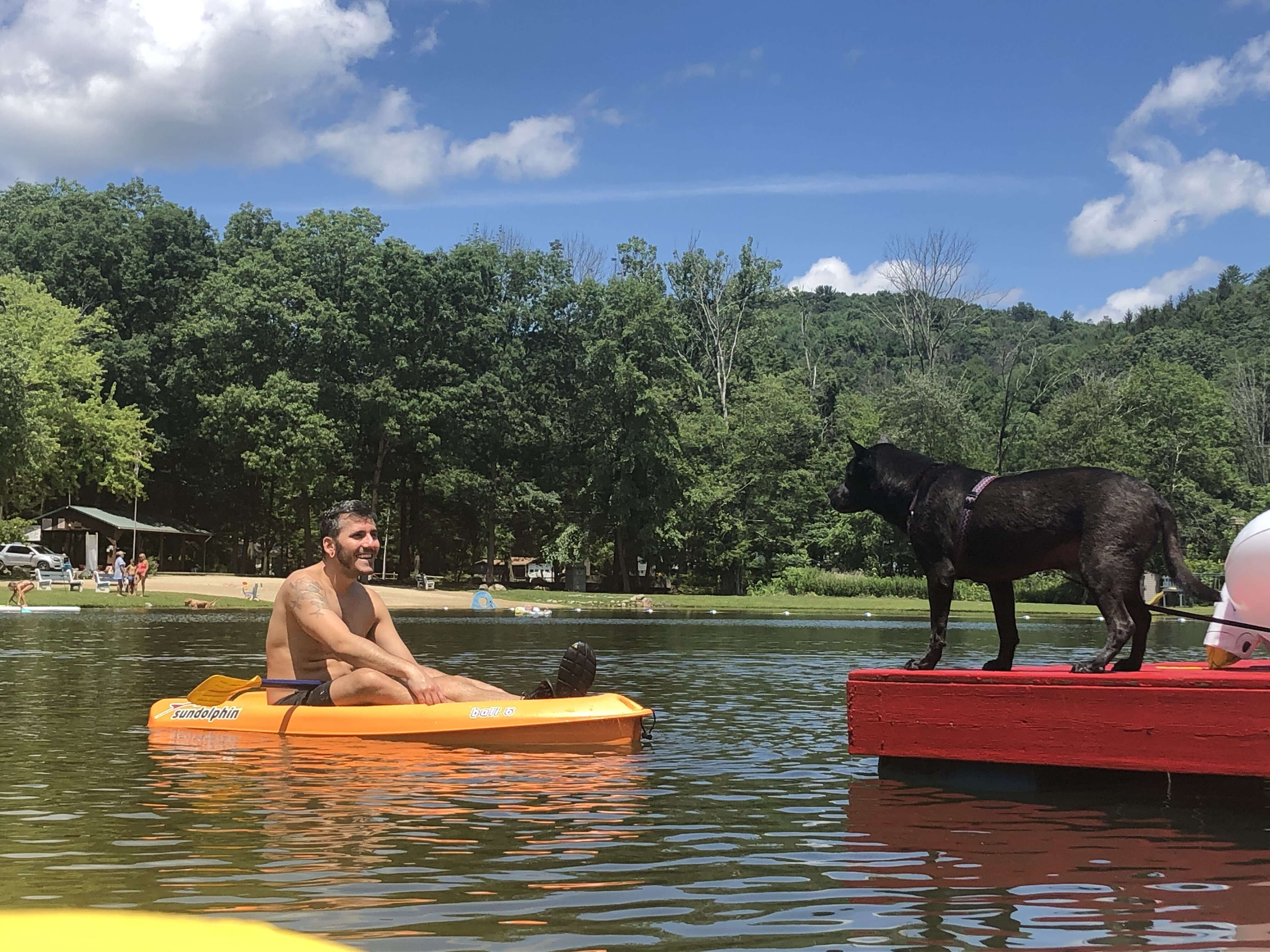 dad and dog go kayaking