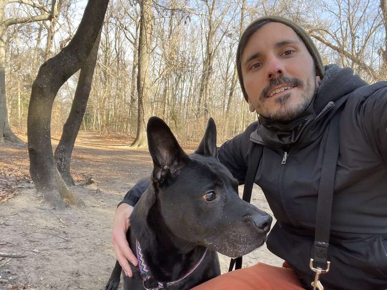 dog and his dad go hiking