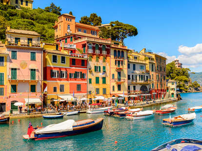 boats floating in the picturesque harbor of Portofino, an Italian fishing village