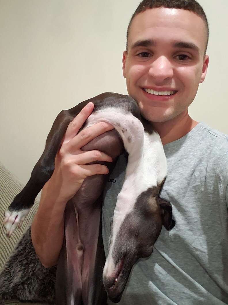Dog melts when his dad tries to take a picture with him