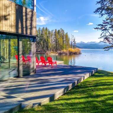 A lakefront cabin with mountain views