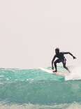 Cherif Fall surfing