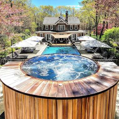 Luxurious Hamptons compound with nine acres of lush landscaping