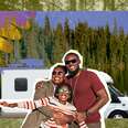 a family hugging outside of an rv