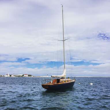 A classic sailboat in the Nantucket Harbor