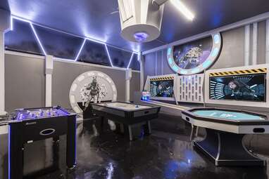 A Cinderella AND Star Wars-themed villa with a waterfall and grotto