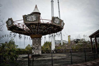 an abandoned carinval swing ride