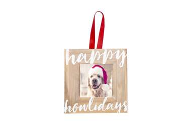 Because nothing captures your pup better than an actual photo: Pearhead Happy Howlidays Christmas Dog Wooden Photo Ornament