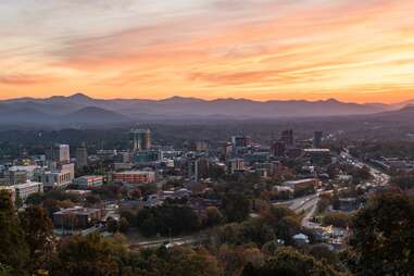a mountain town at sunset