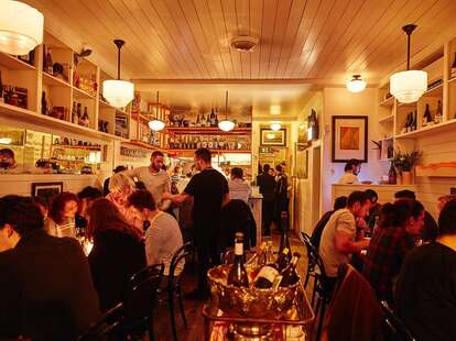 a busy, dimly-lit restaurant