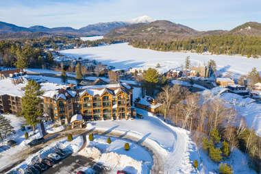 a lodge and small town covered in snow