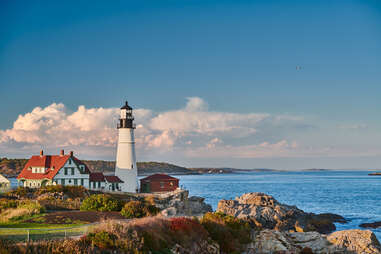 a lighthouse looking out over the ocean