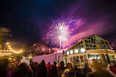 fireworks over a wintery city