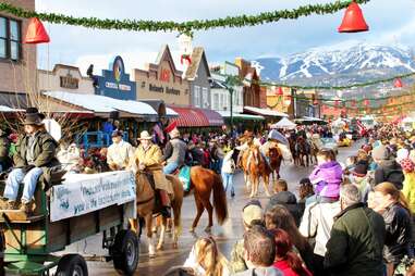 a wintertime parade in a mountain