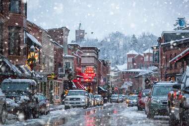a small town main street on a snowy day