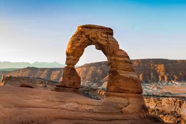 a giant sandstone arch in utah's high desert