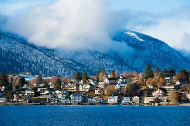 a lakeside town at the foot of a mountain