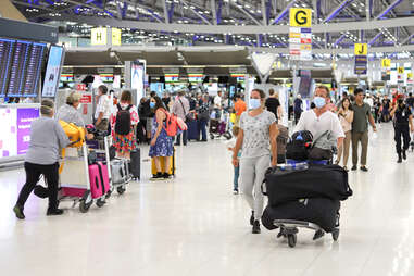 masked people in airport