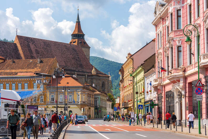 People walking on the street of a beautiful medieval city