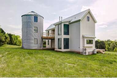 A Virginia farmhouse with a furnished silo and Scottish Highland cattle
