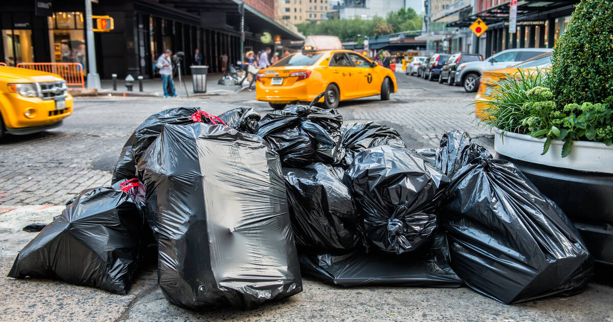 What's up with those violet trash bags appearing around Austin?