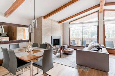 Contemporary chalet-style condo with mountain views