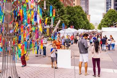 Looking Down the Street Past a Colorful Art Piece at the Raleigh "Artsplosure" Festival