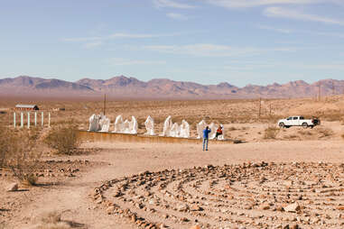 ghost sculptures in the desert