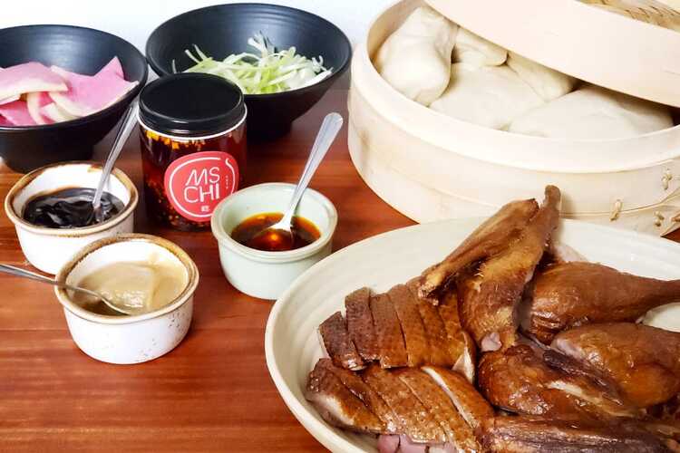 Dim Sum or Chinese dumpling in a stream hot pot of food wheelbarrow on  street food of Bangkok. Many dumpling in a wooden basket is streaming in  old As Stock Photo 