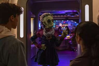 people talking to an alien