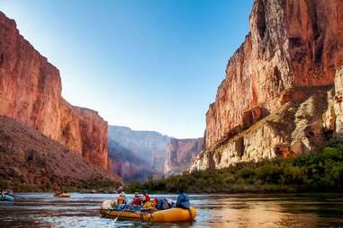 rafters on The Colorado River in the Grand Canyon at sunrise