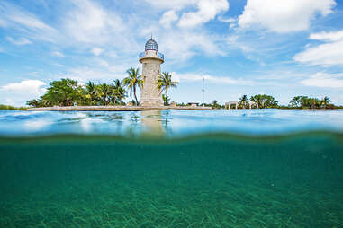 a lighthouse on a small island