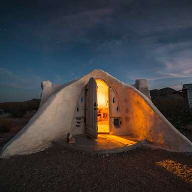 Solar-powered adobe dome